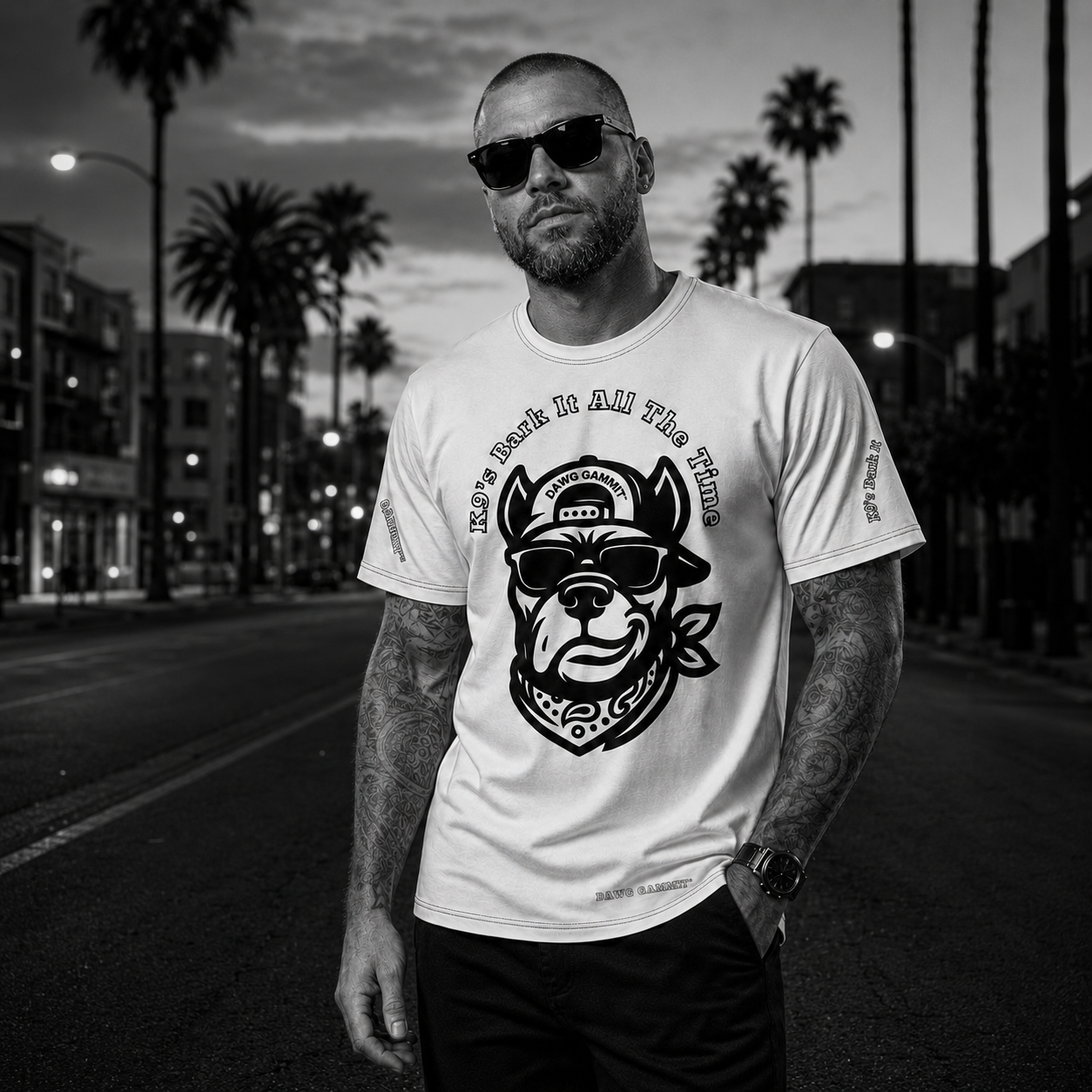 Supplied black-and-white DAWG GAMMIT Cane Corso Signature campaign model wearing the white graphic tee